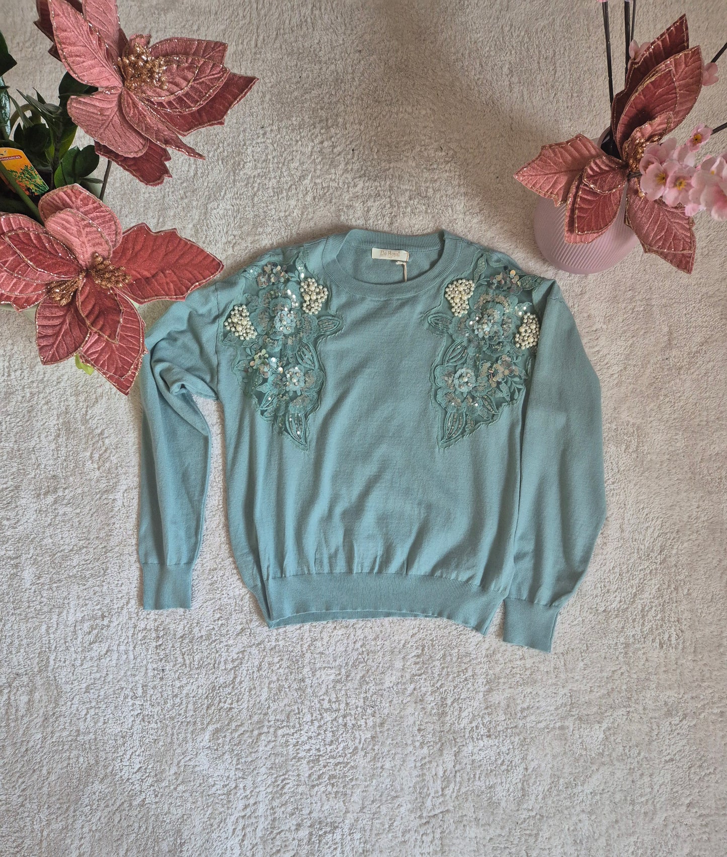 Maglione con decorazioni floreali e perle